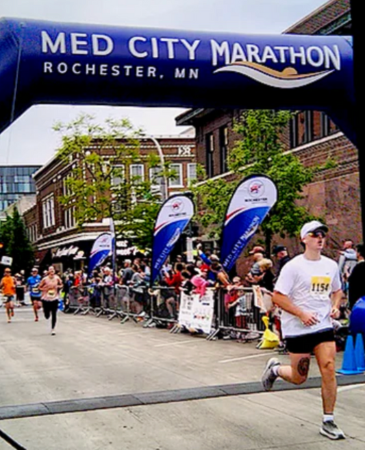 Dane Loucks finishing the May 19, 2024 Med City Marathon
