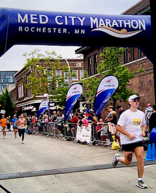 Dane Loucks finishing the May 19, 2024 Med City Marathon 